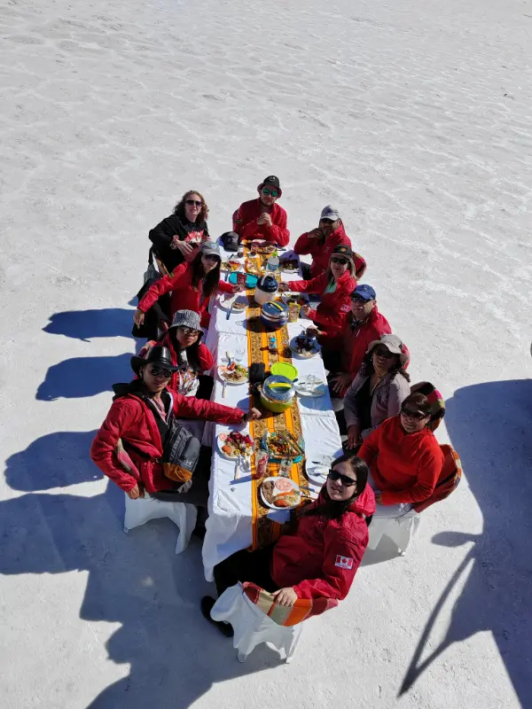 Travelers having lunch on the salt flat